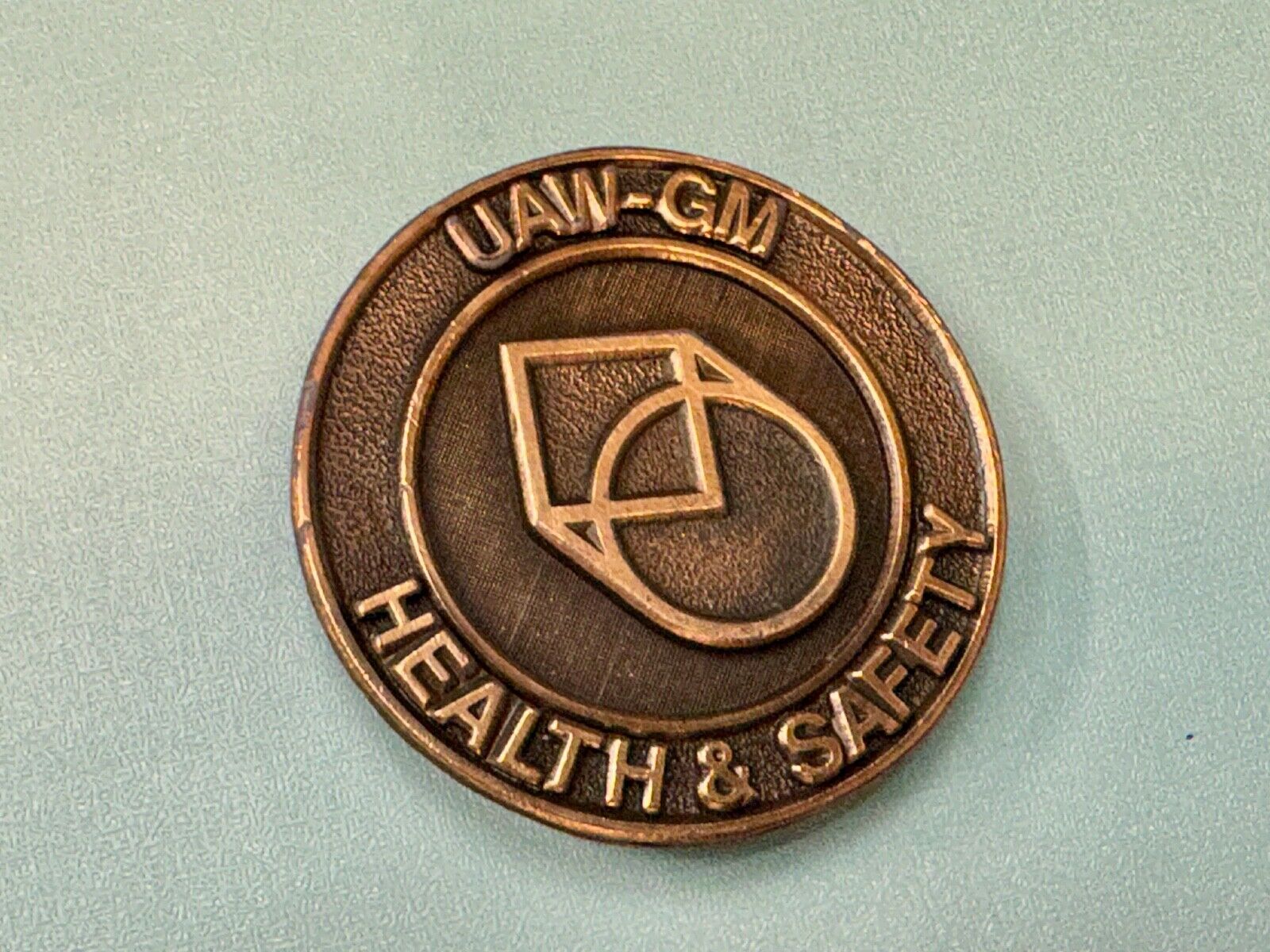 UAW-GM auto workers union round Health & Safety Award belt buckle