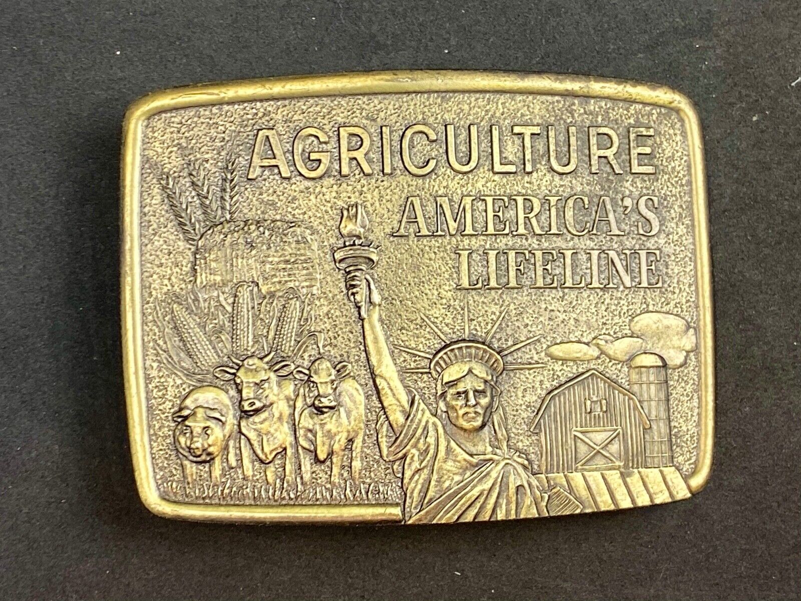 AGRICULTURE, Americas Lifeline belt buckle by Farmhand - Statue of liberty 