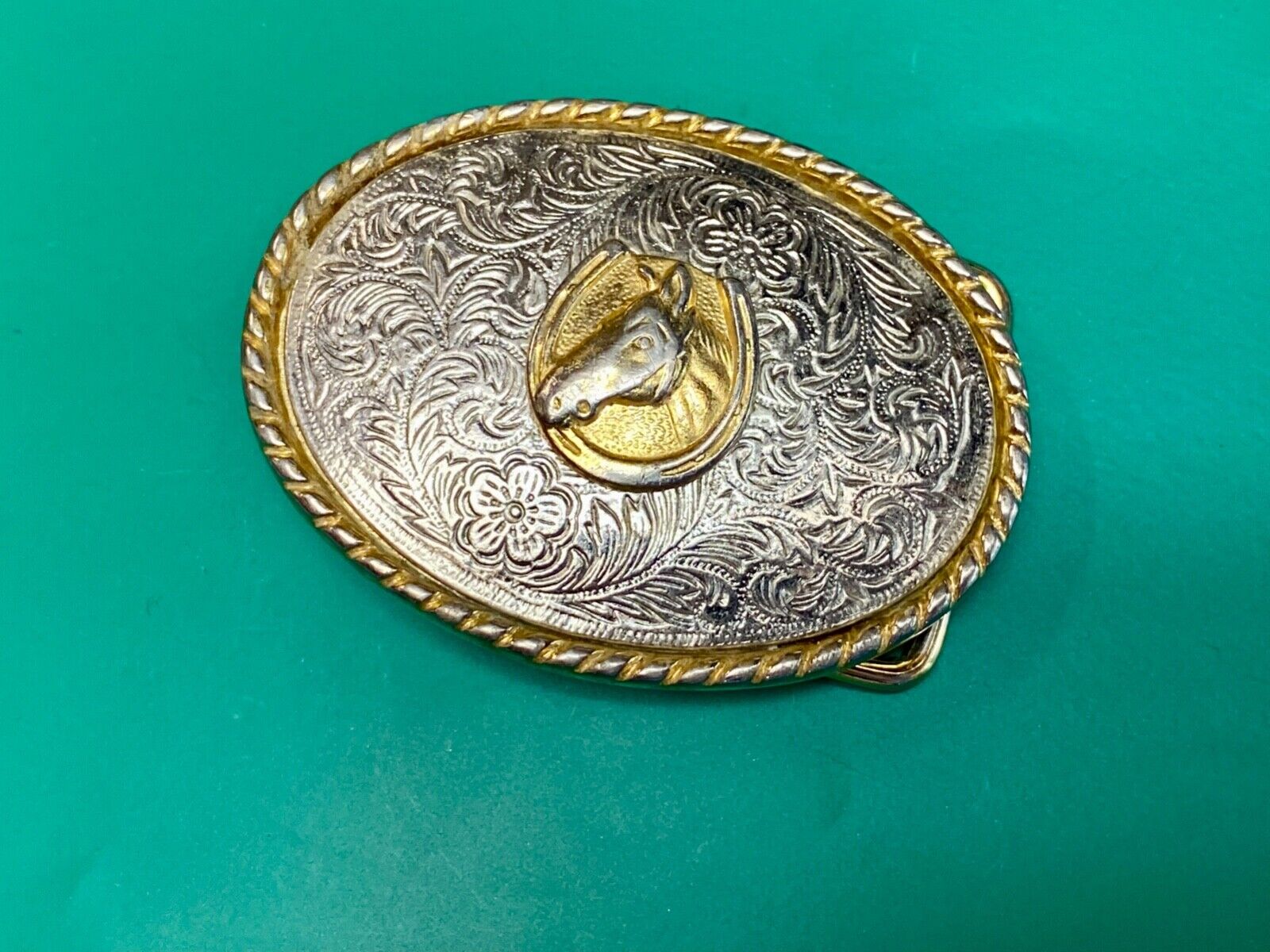 Vintage horse head inside of lucky horseshoe two toned western belt buckle