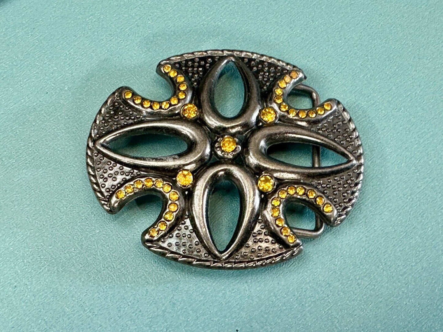 unique see through iron cross with golden brown rhinestone accents