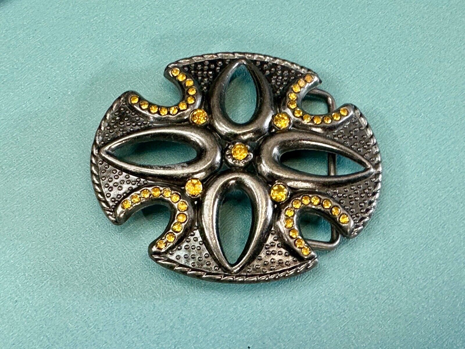 unique see through iron cross with golden brown rhinestone accents