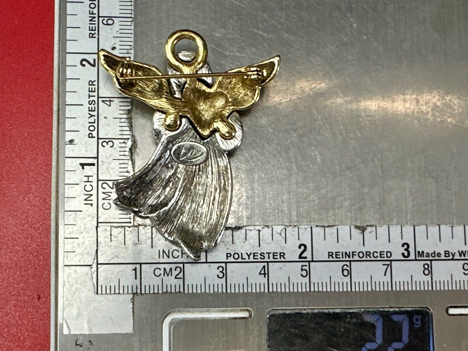 Angle holding heart -vintage two tone LC Liz Claiborne Signed Brooch Pin
