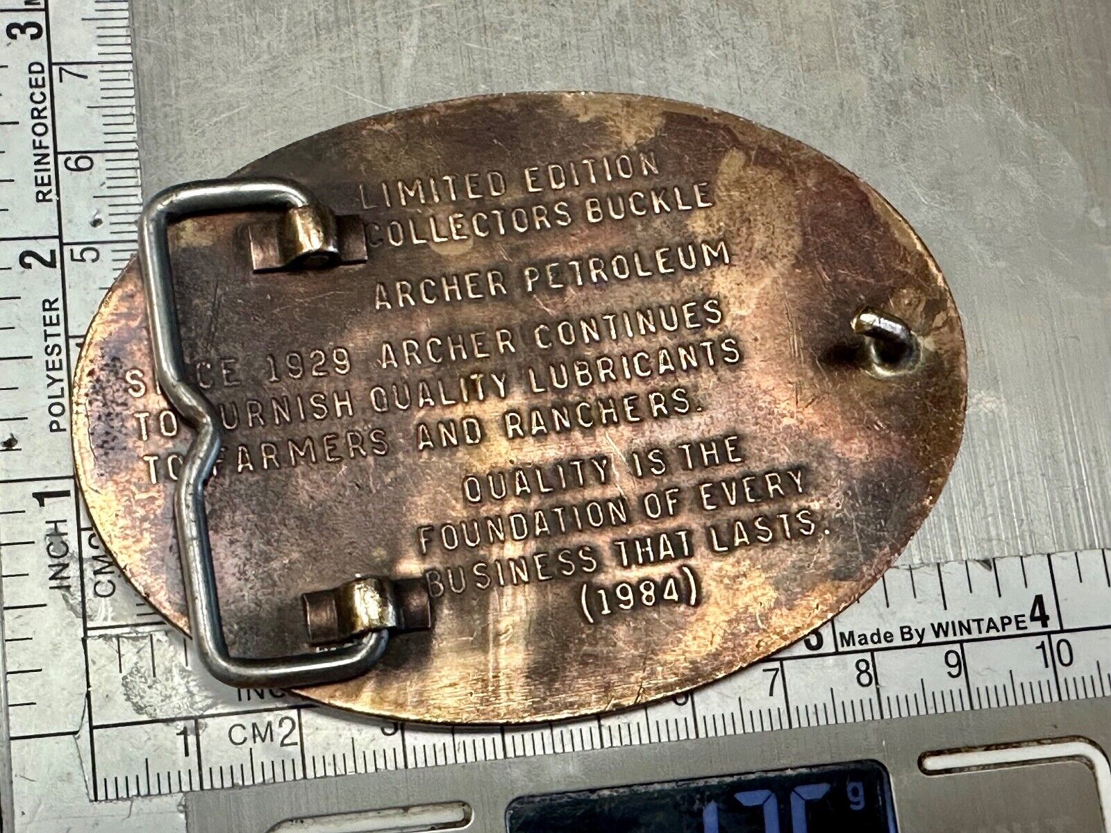Archer Lubricants Omaha NE - Oil for farmers ranchers belt buckle
