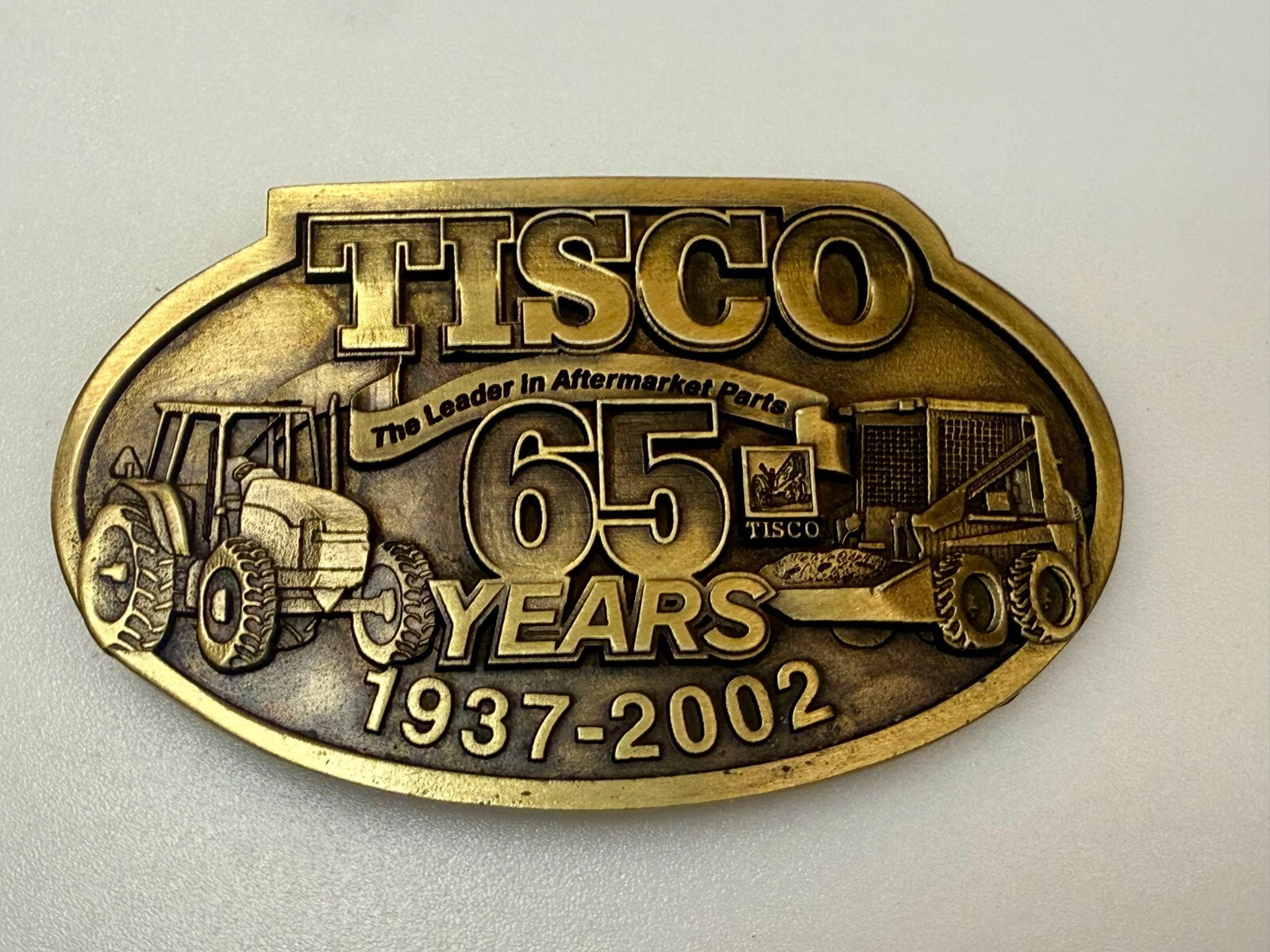 TISCO The Leader in Aftermarket Parts 65 Years 1937-2002 SPEC-CAST Belt Buckle