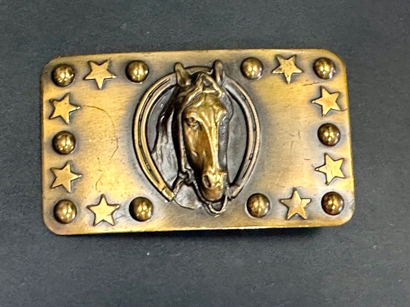 Vintage Horse head belt buckle with stars and circles boarder
