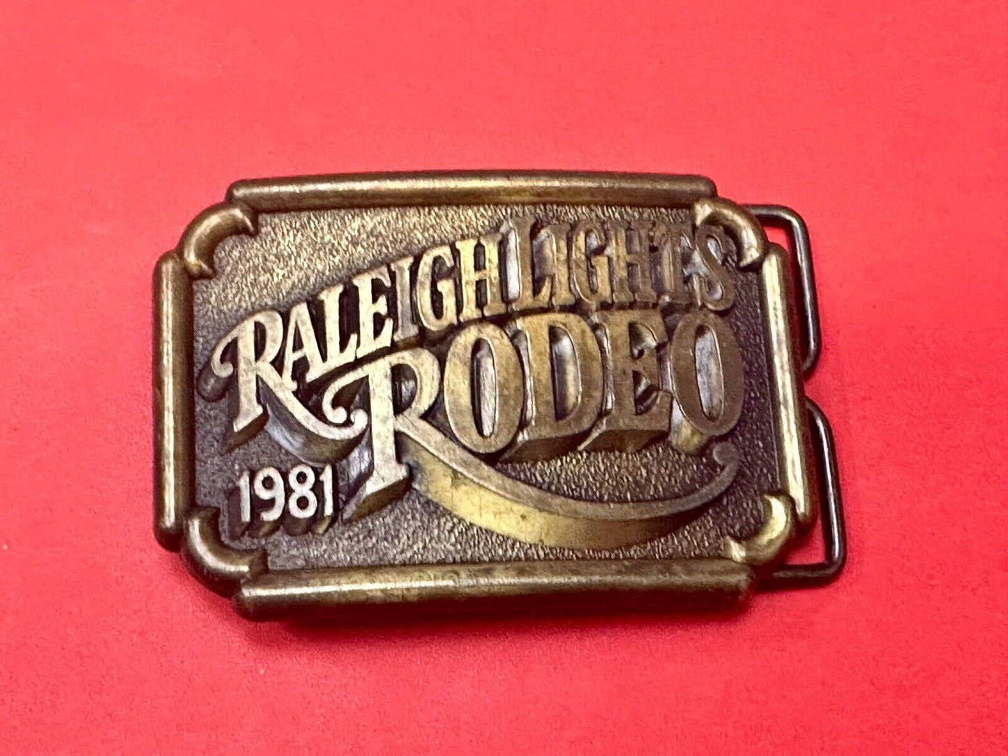 Vintage 1981 Raleigh Lights Rodeo Brass Tone Belt Buckle Advertising Cigarettes