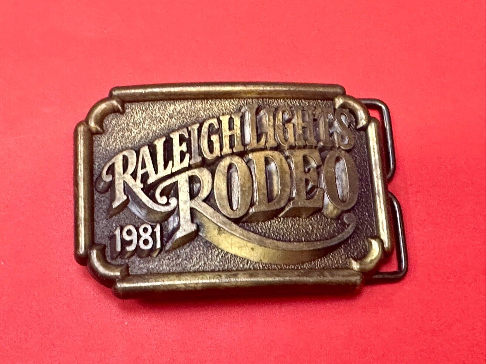Vintage 1981 Raleigh Lights Rodeo Brass Tone Belt Buckle Advertising Cigarettes