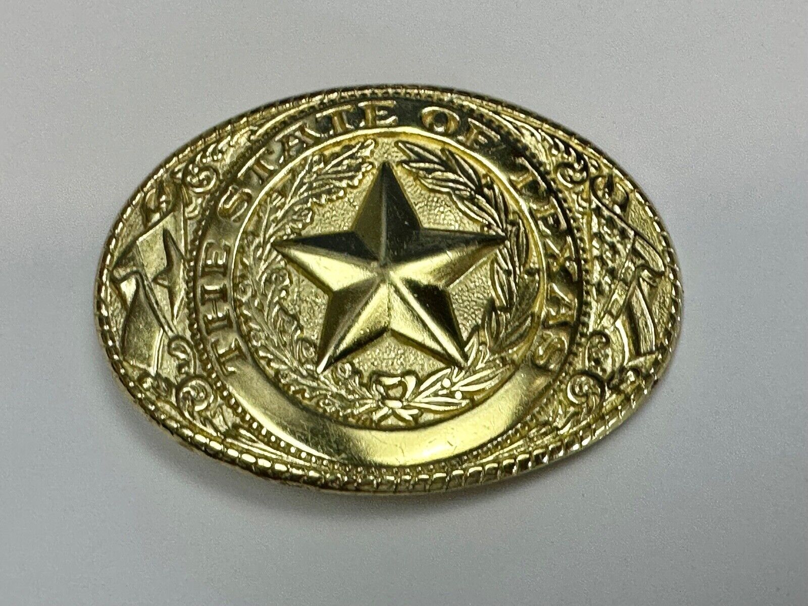 The Great State of Texas - Lone Star Flags seal gold & white color belt buckle