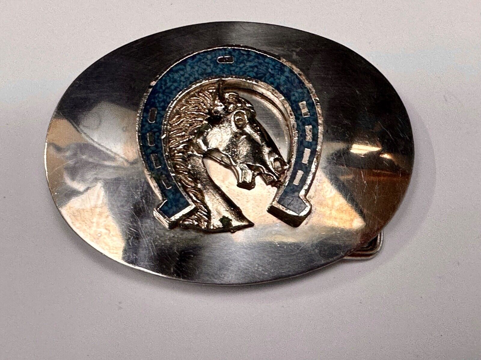 Vintage horse head bust in turquoise chip horseshoe on western belt buckle