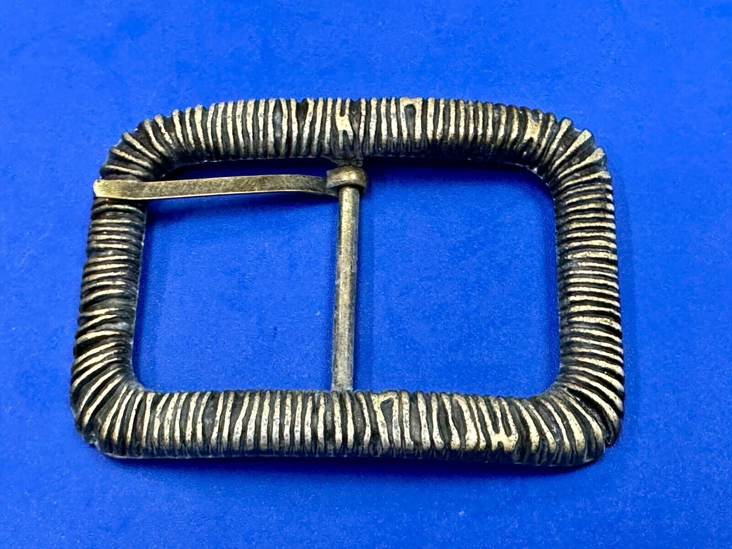 Unique Center Bar Spring abstracted wrapped style rectangular belt buckle