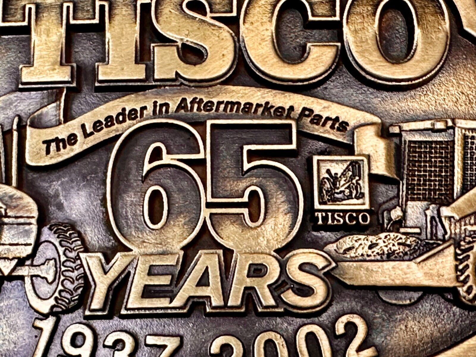 65 Years TISCO 2002 Tractor Implement Supply company NOS Belt Buckle