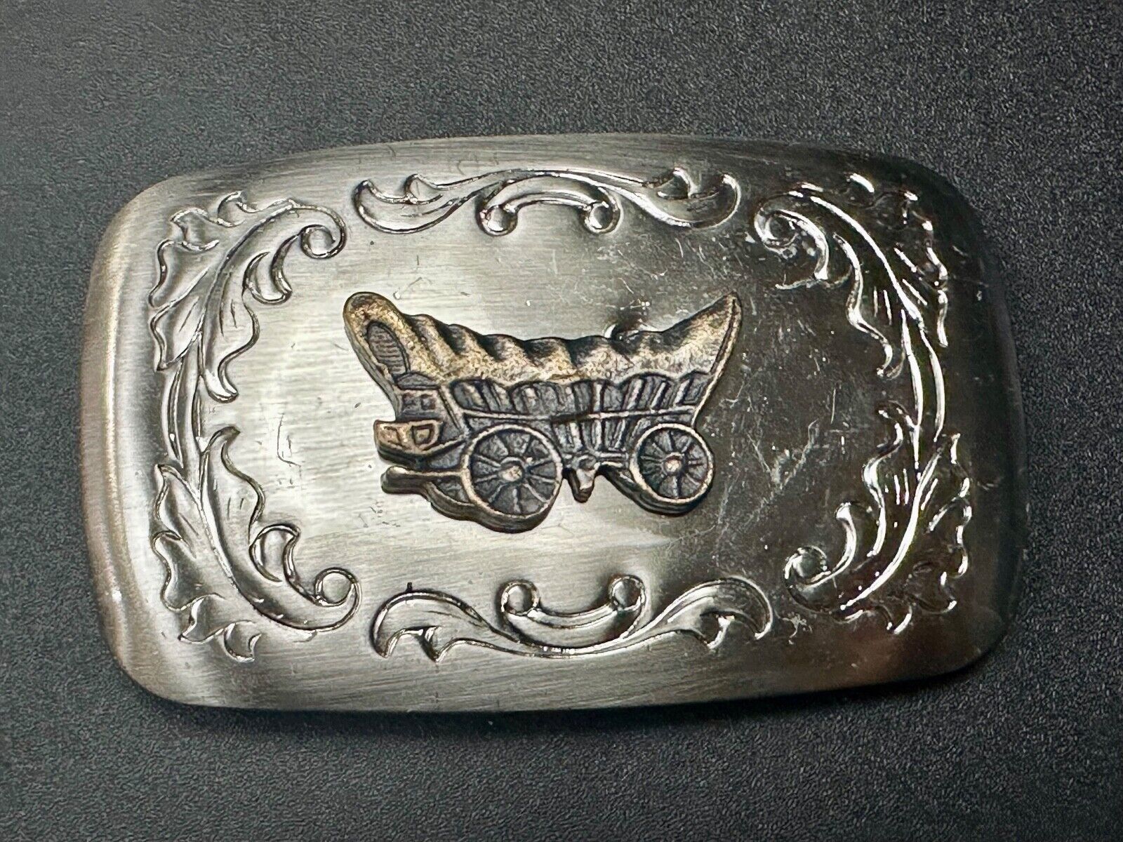 Vintage covered wagon two tone western mixed metal belt buckle