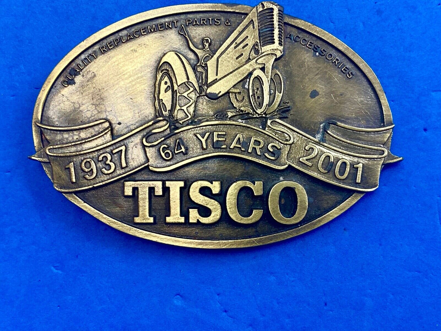 64 years - Tisco Tractor Implement Supply Spec Cast Farming Belt Buckle 