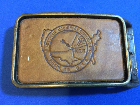 Vintage brass and leather belt buckle    Midwestern Machinery Company  Joplin MO