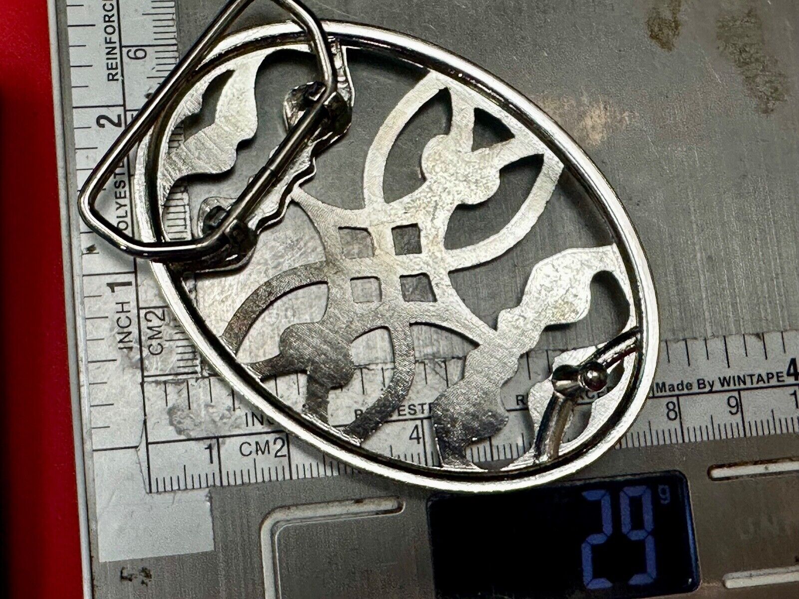 Unique cutout skeleton pattern silver tone oval belt buckle