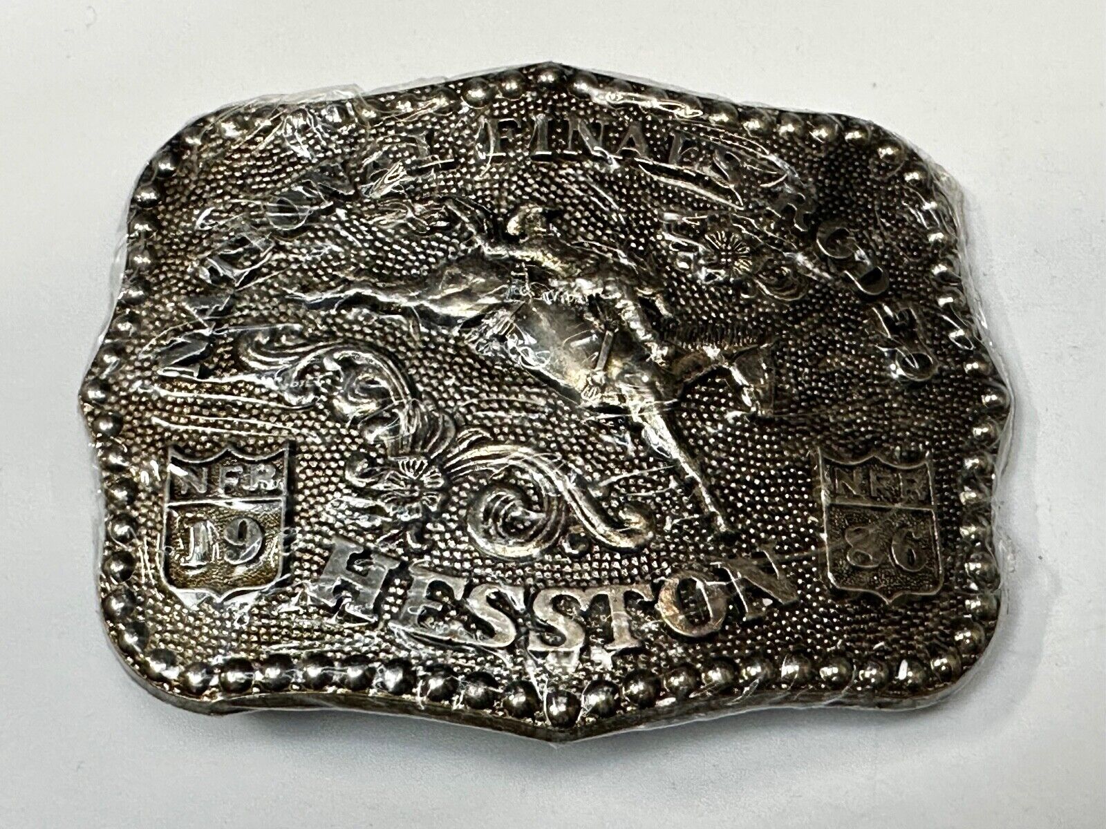 1986 ADULT SIZE NATIONAL FINALS RODEO HESSTION NFR NOS Cowboys Belt Buckle