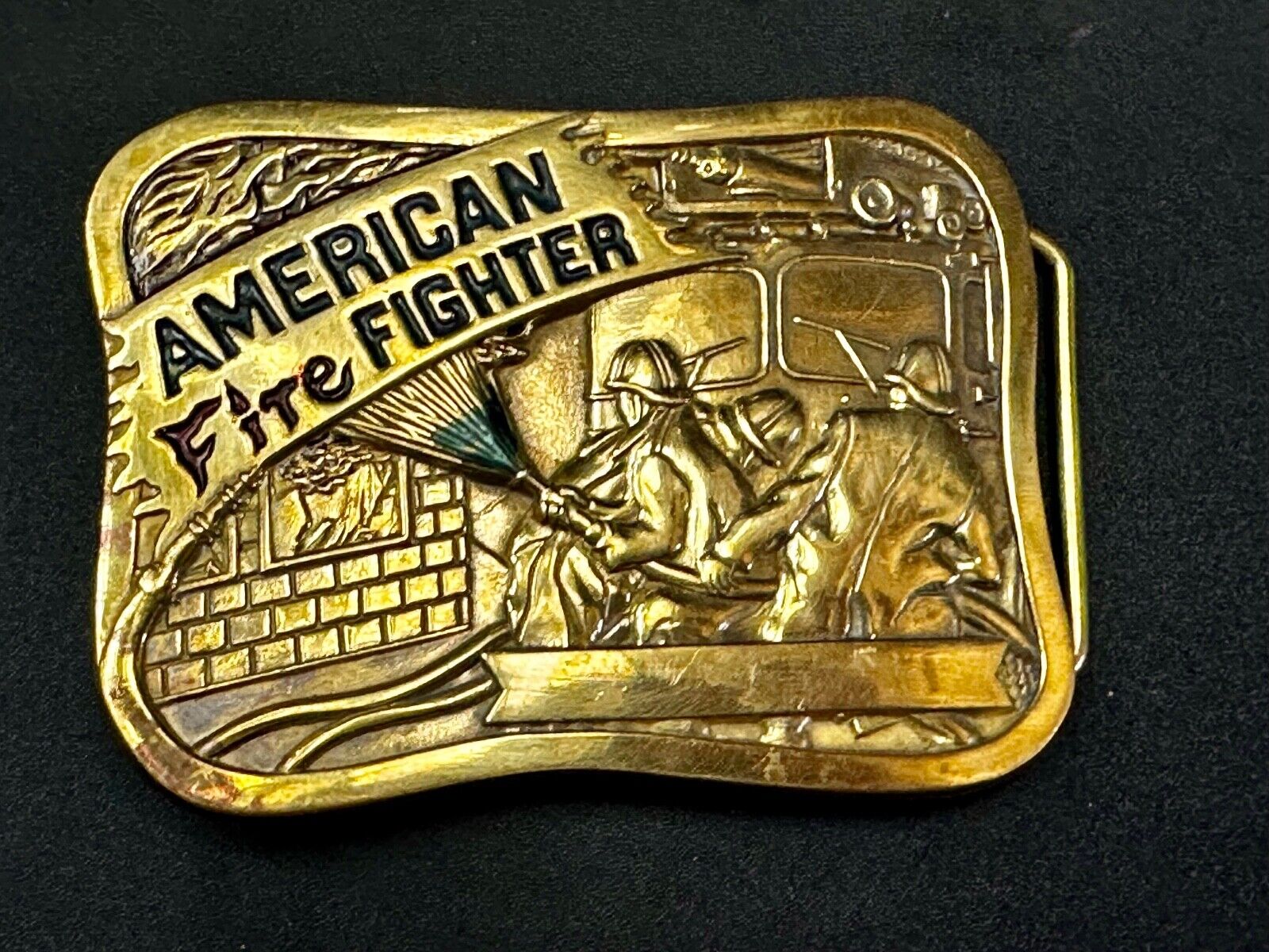 American Firefighters at work putting out fire Vintage 1981 Baron Belt Buckle