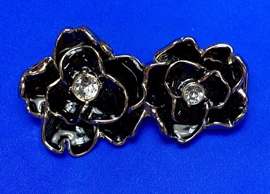 Beautiful two figural flowers with jewels as black & silver colored belt buckle
