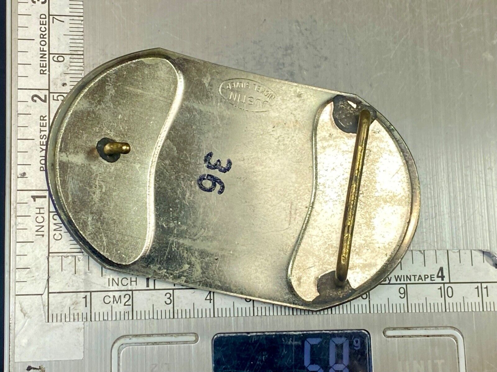 Vintage Justin Boot Co Maker Nickel Silver western belt buckle marked 36