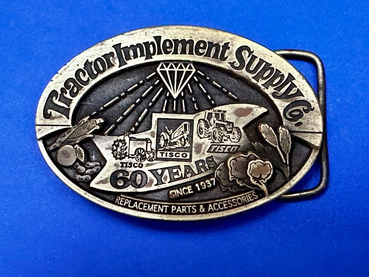 60 Years TISCO Tractor Implement Supply company NOS Belt Buckle by Speccast