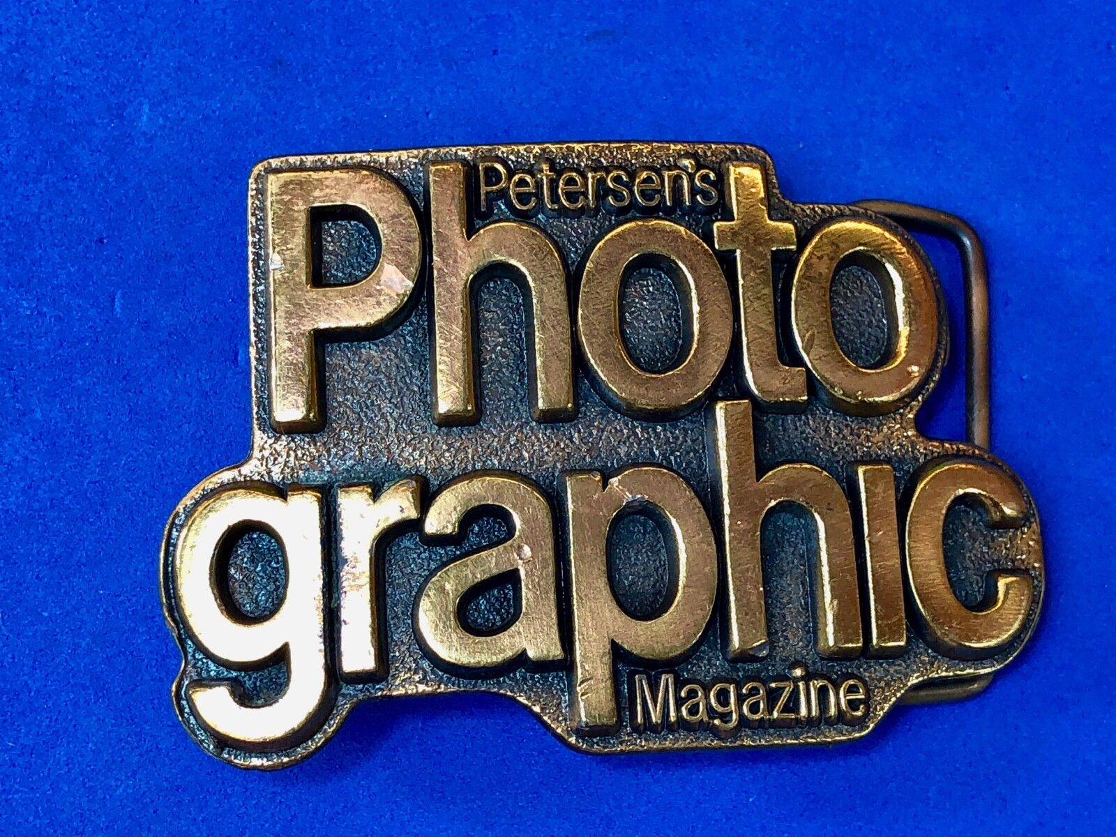 Vintage 1970’s. Petersens PHOTO GRAPHIC Magazine Advertising Logo Belt Buckle 