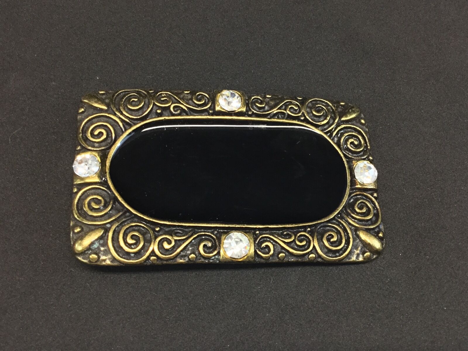 3.5".  Designer / western / dress / Black and brass tone rhinestone belt buckle