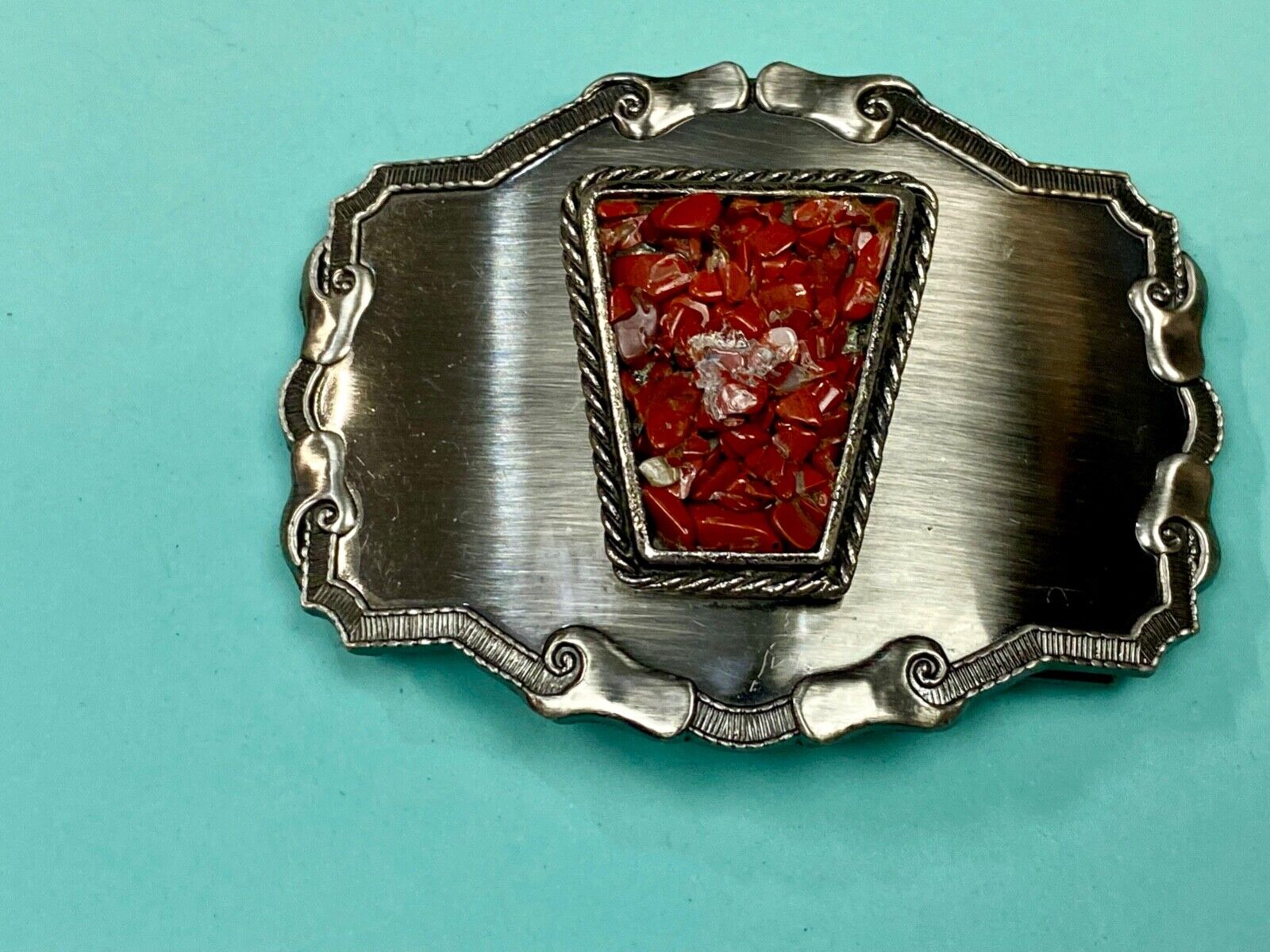 Vintage chunky red stones in centerpiece of Western Thick framed belt buckle