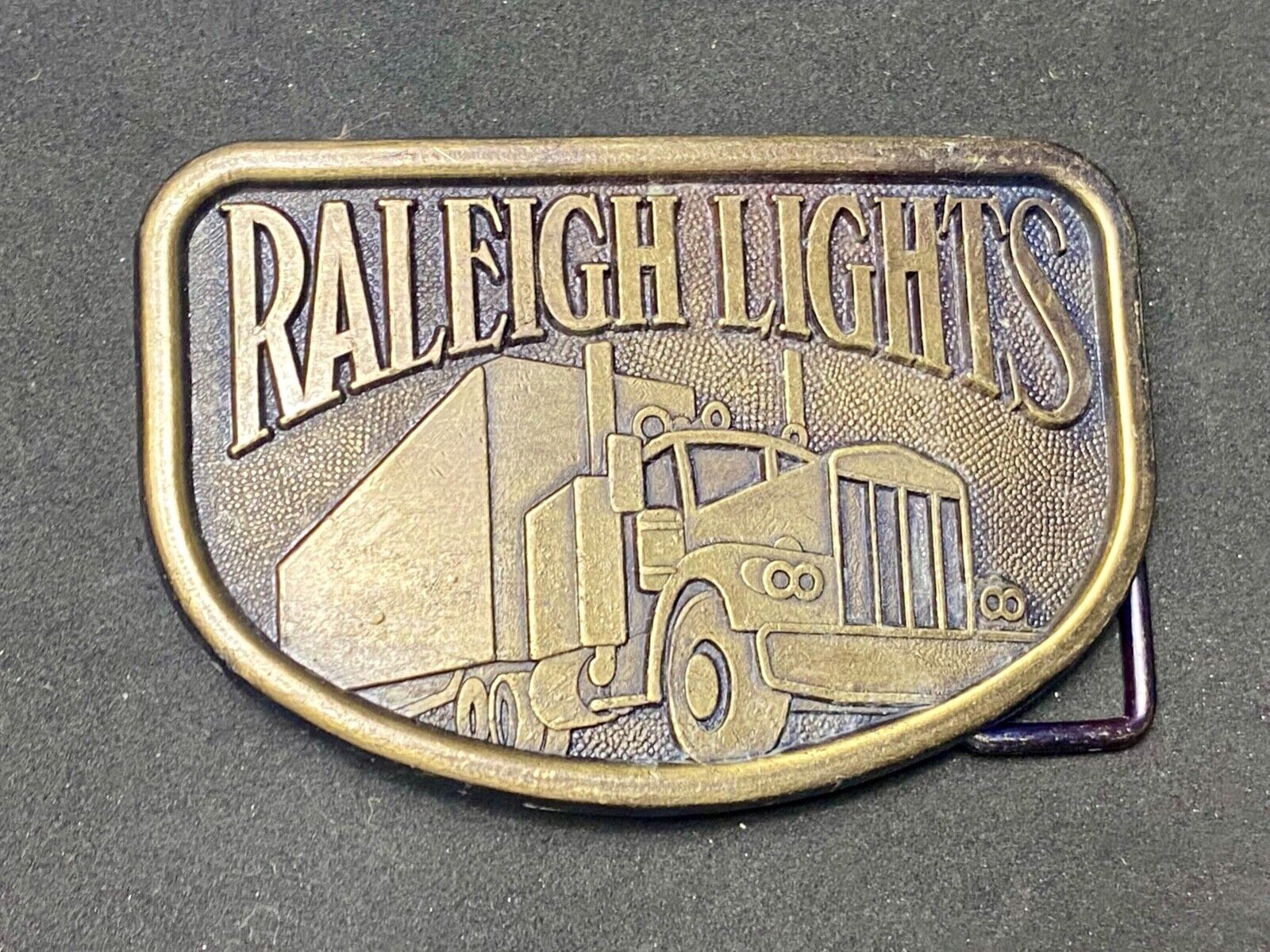 1970s Vintage Raleigh Lights Semi Truck Trucker Brass Tone Belt Buckle by RJ