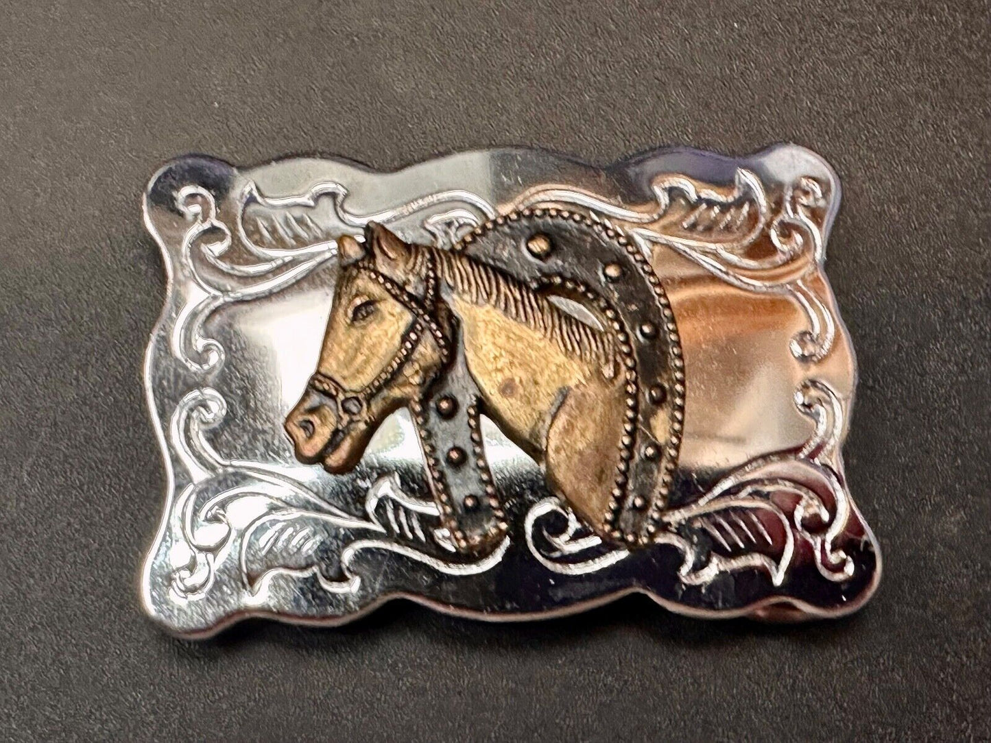 Vintage lucky horseshoe with head centerpiece on western two tone belt buckle