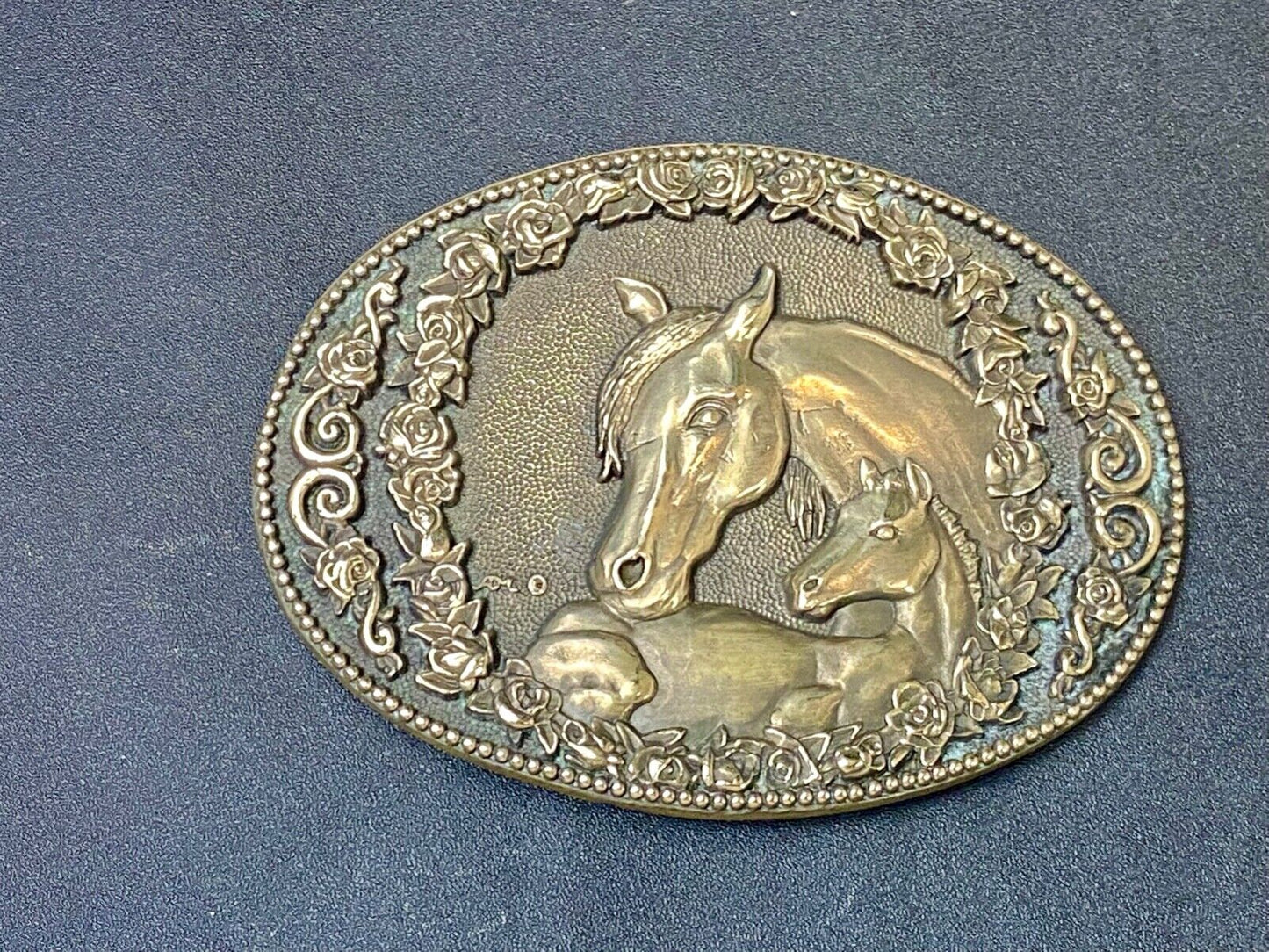 Two horse heads First addition brass belt buckle by Award Design Medals