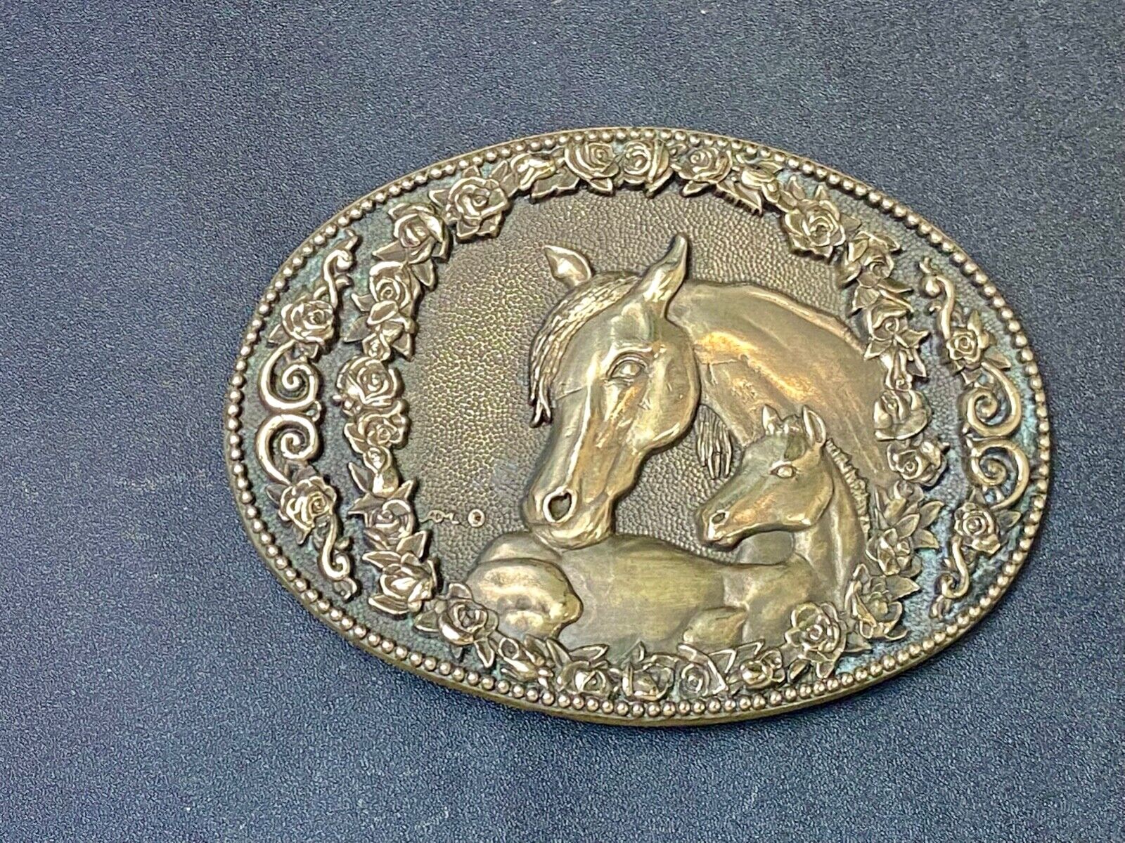Two horse heads First addition brass belt buckle by Award Design Medals