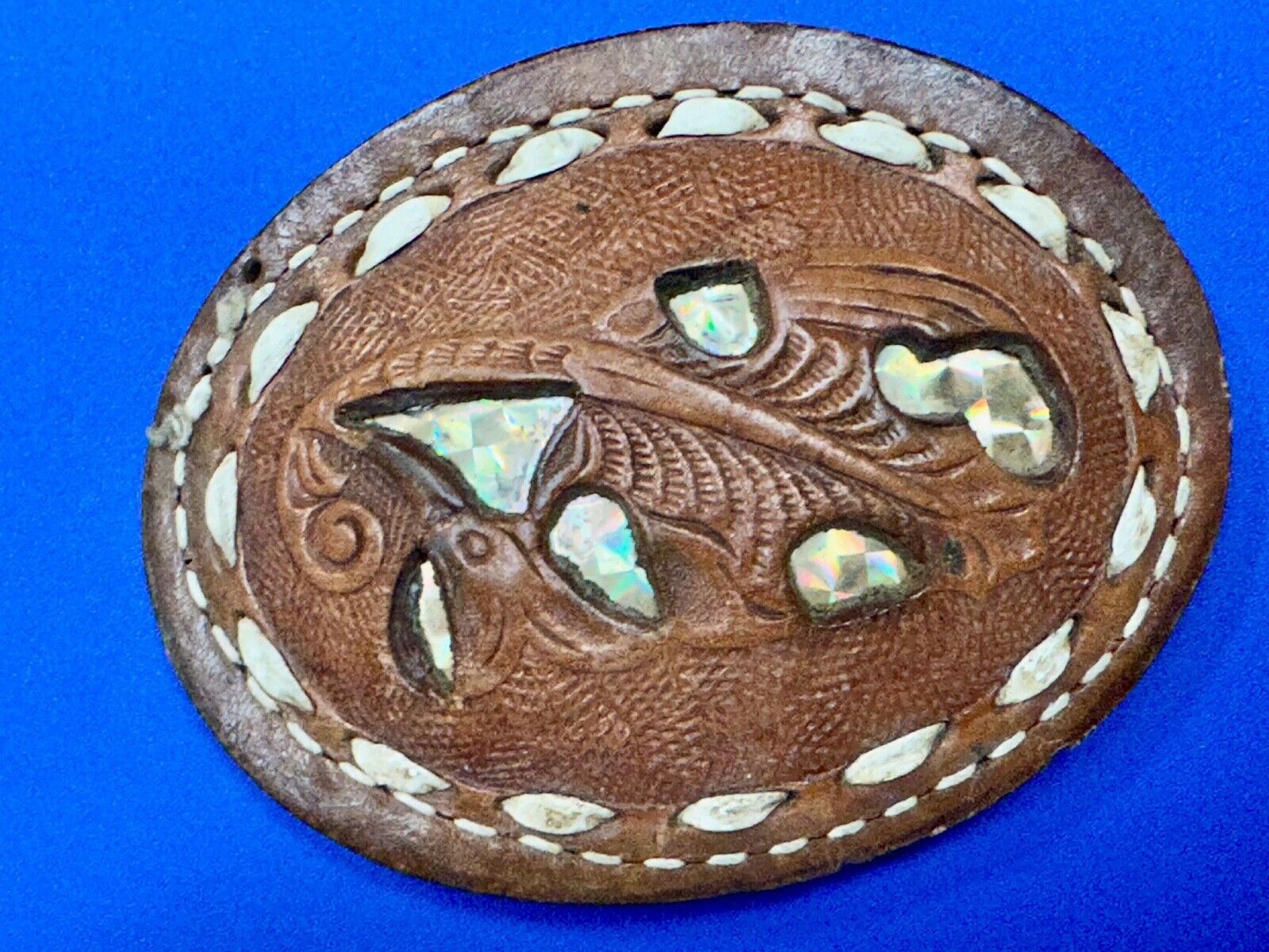 Unique leaf pattern in leather belt buckle made of Abalone shell