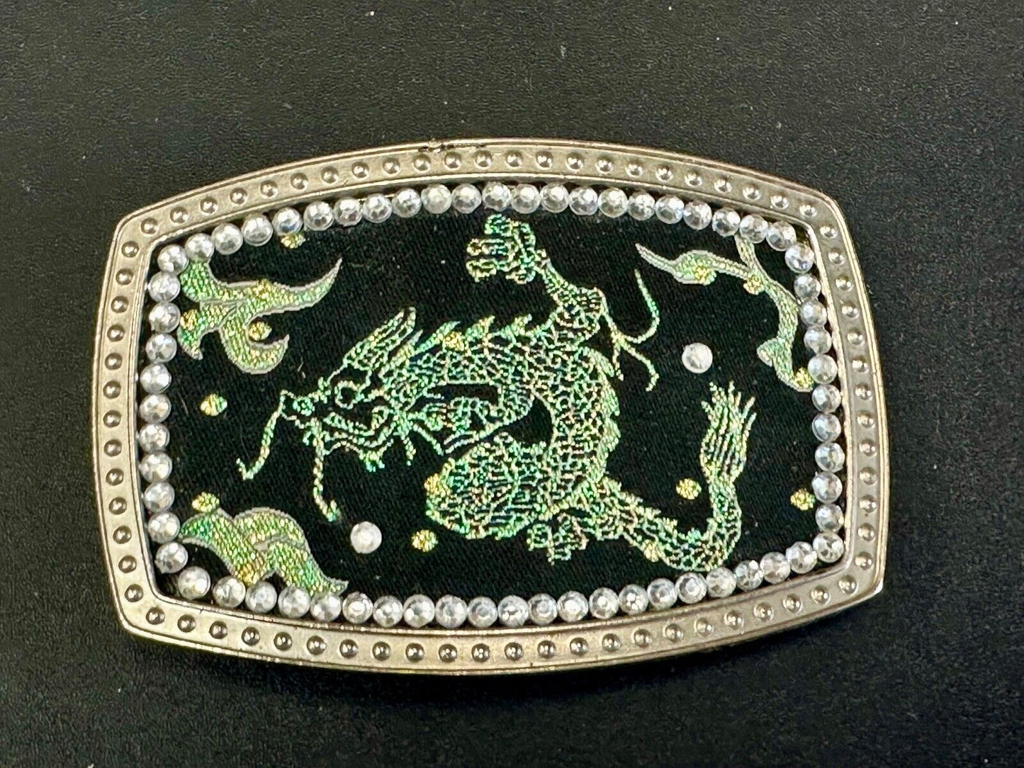 Chinese Dragon pattern symbol on silver tone rhinestone accented belt buckle