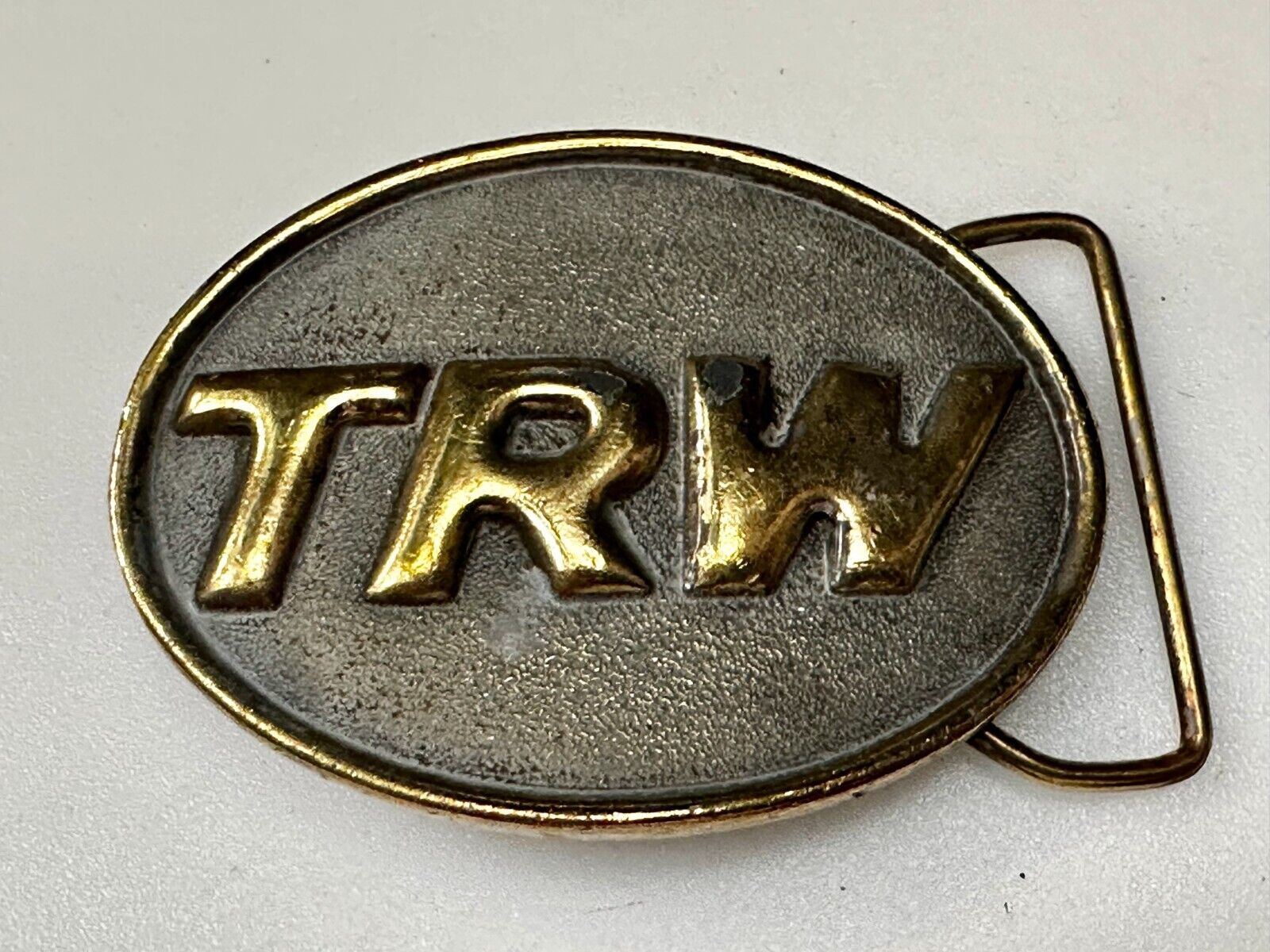 TRW Automotive Parts Advertising Vintage Belt Buckle by Indiana Metal Craft