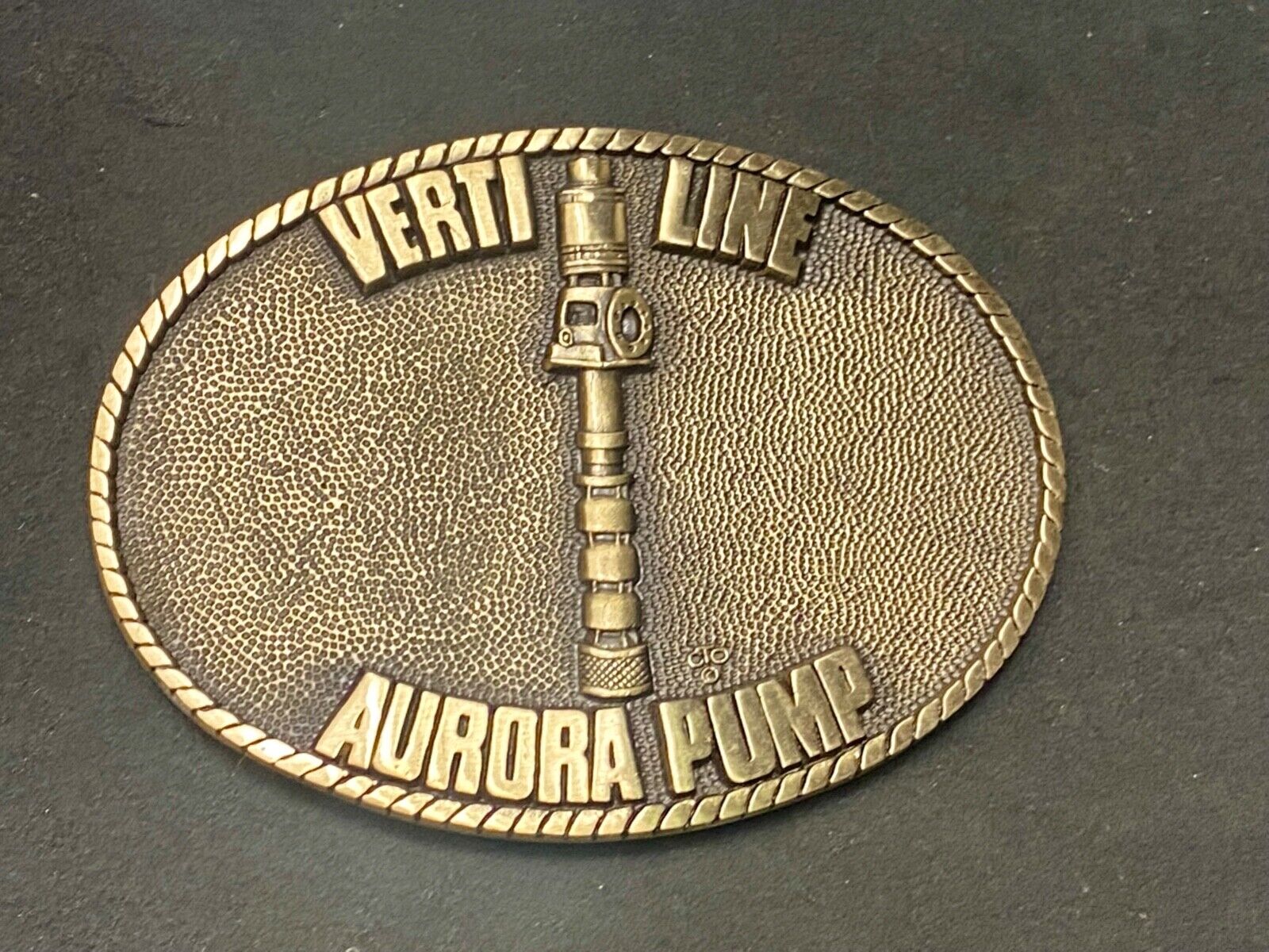 Verti line Aurora Pump belt buckle by OC Tanner Turbine pumps Co commemorative
