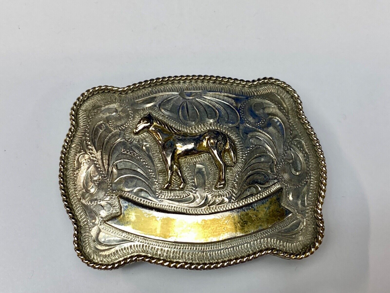 Vintage HORSE western Justin Boot Company belt buckle with Award Ribbon