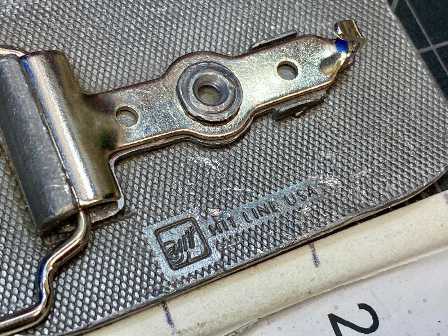 unknown to me, vintage metal belt buckle by HitLine INC.   Company Logo?