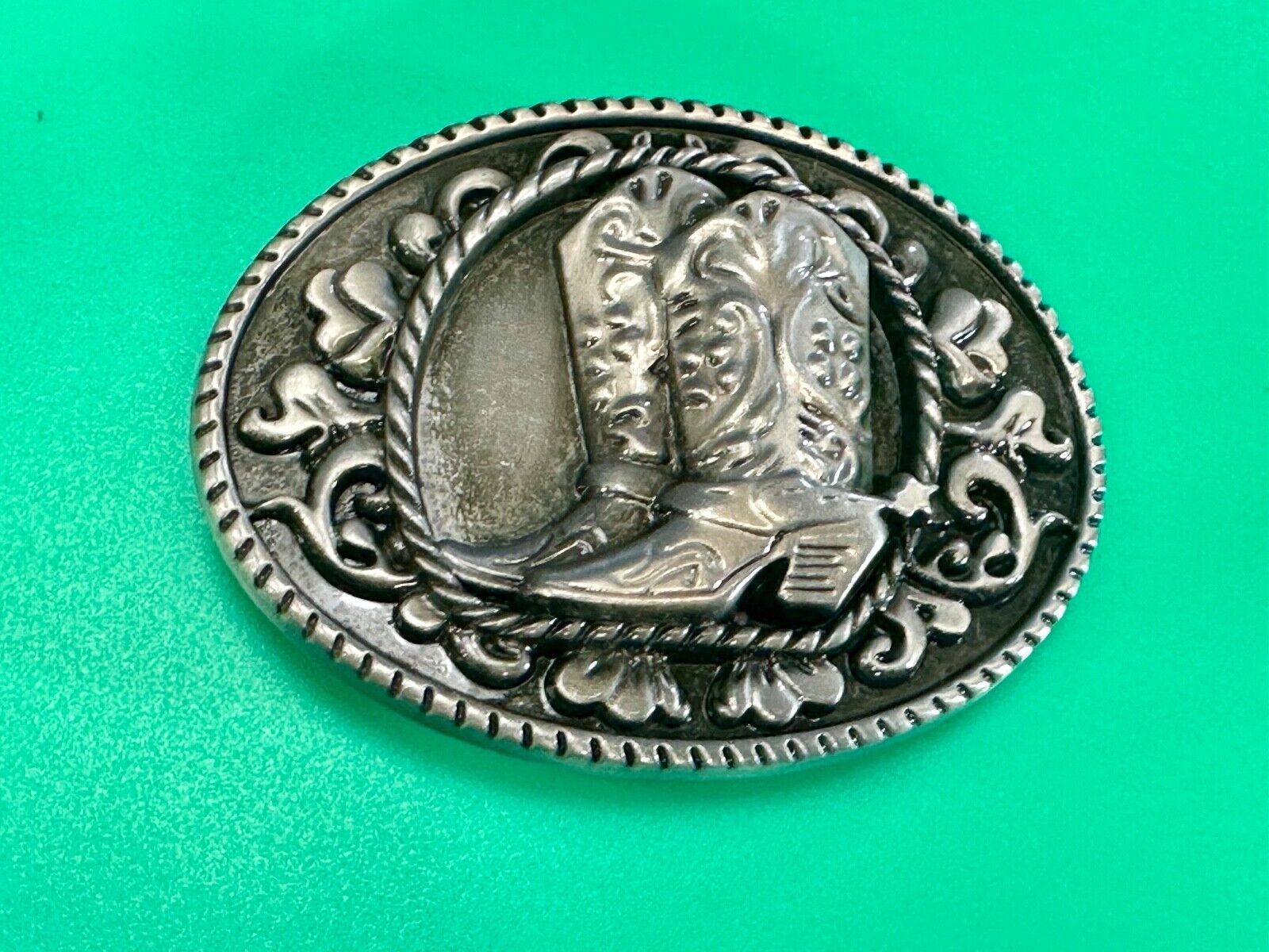 Western Cowboy Boots Belt Buckle with ornate flower swirl and rope boarder