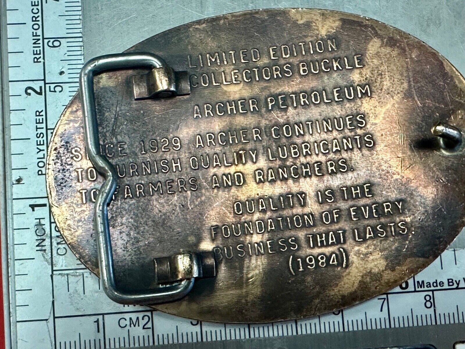 Archer Lubricants Omaha NE - Oil for farmers ranchers belt buckle