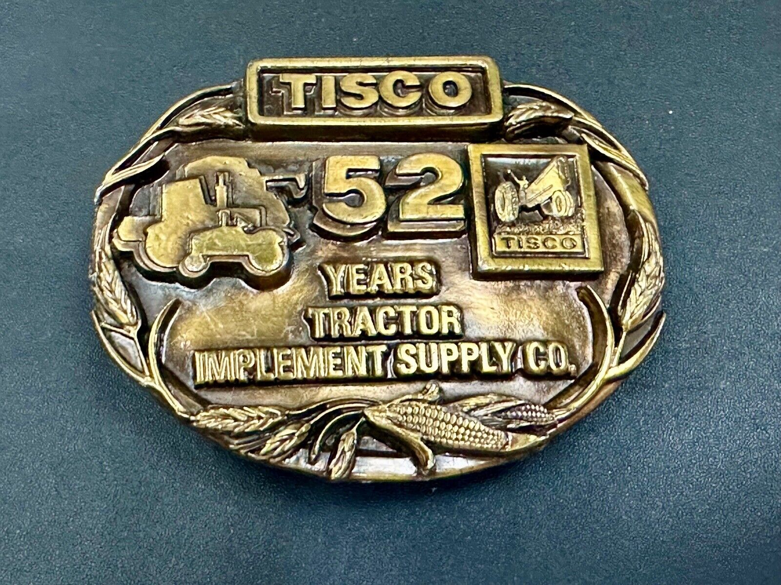 TISCO 52 years commemorative belt buckle  Tractor Implement Supply