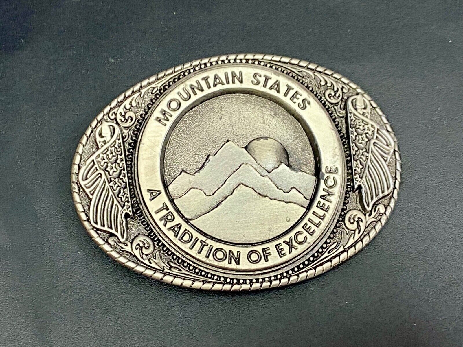 The Mountain States A Tradition Of Excellence Western Oval Belt Buckle