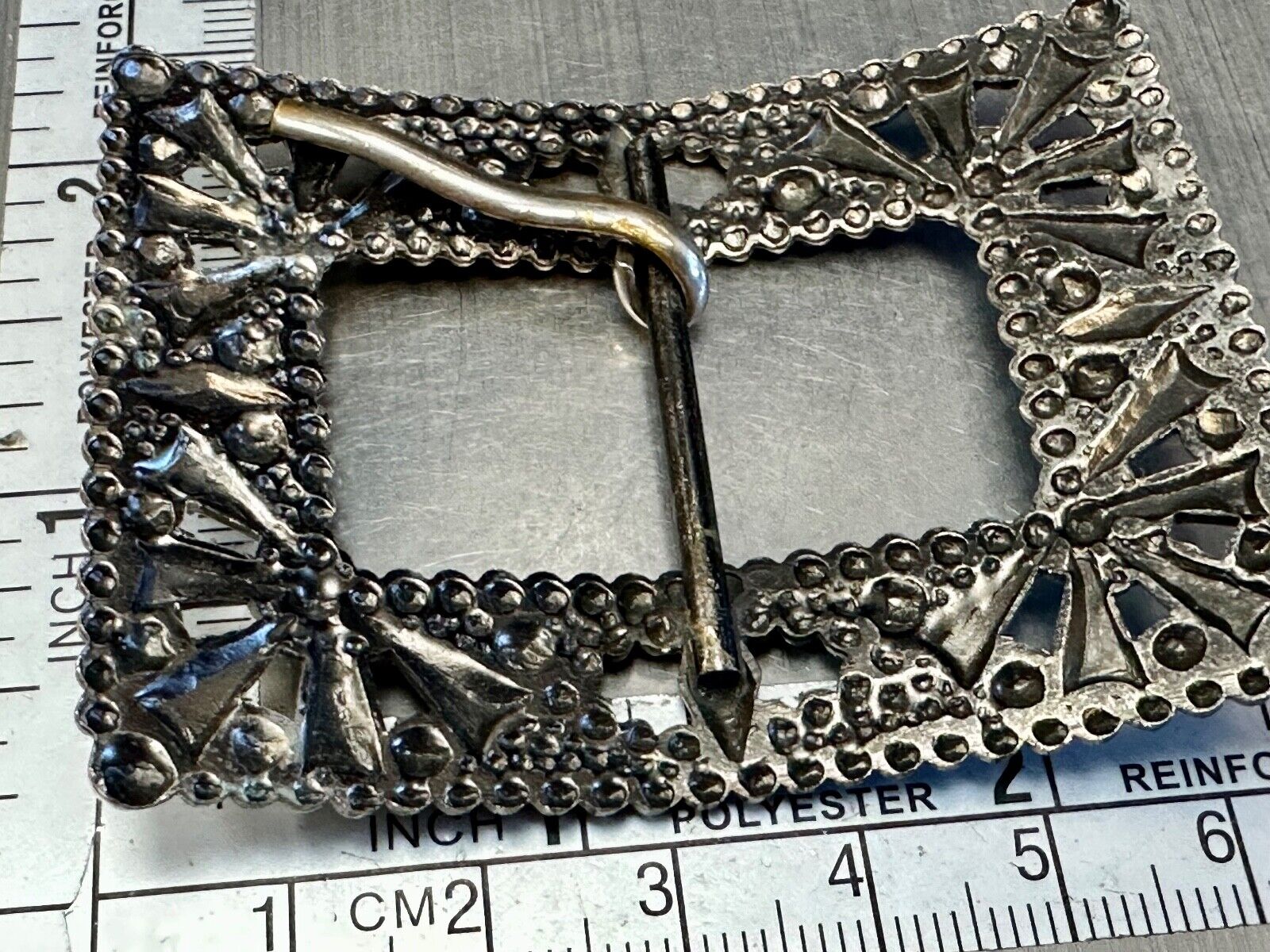 Antique silver color rectangular see through ornate belt buckle