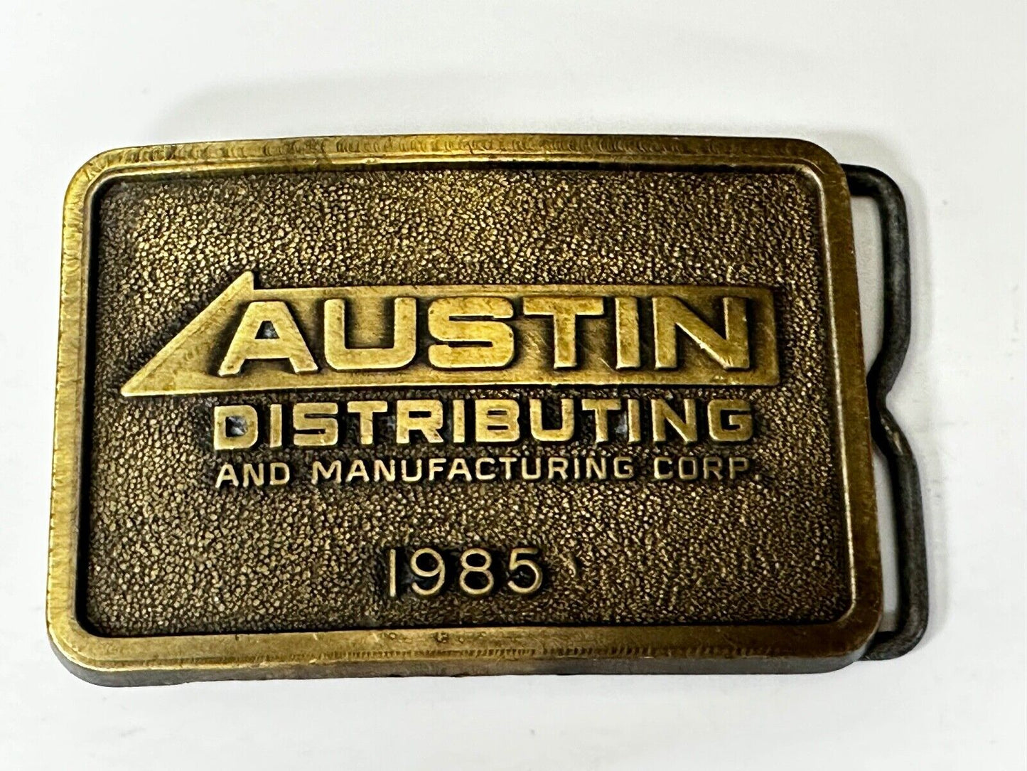 Austin Texas Distributing and Manufacturing 1985 Advertisement Promo Belt Buckle