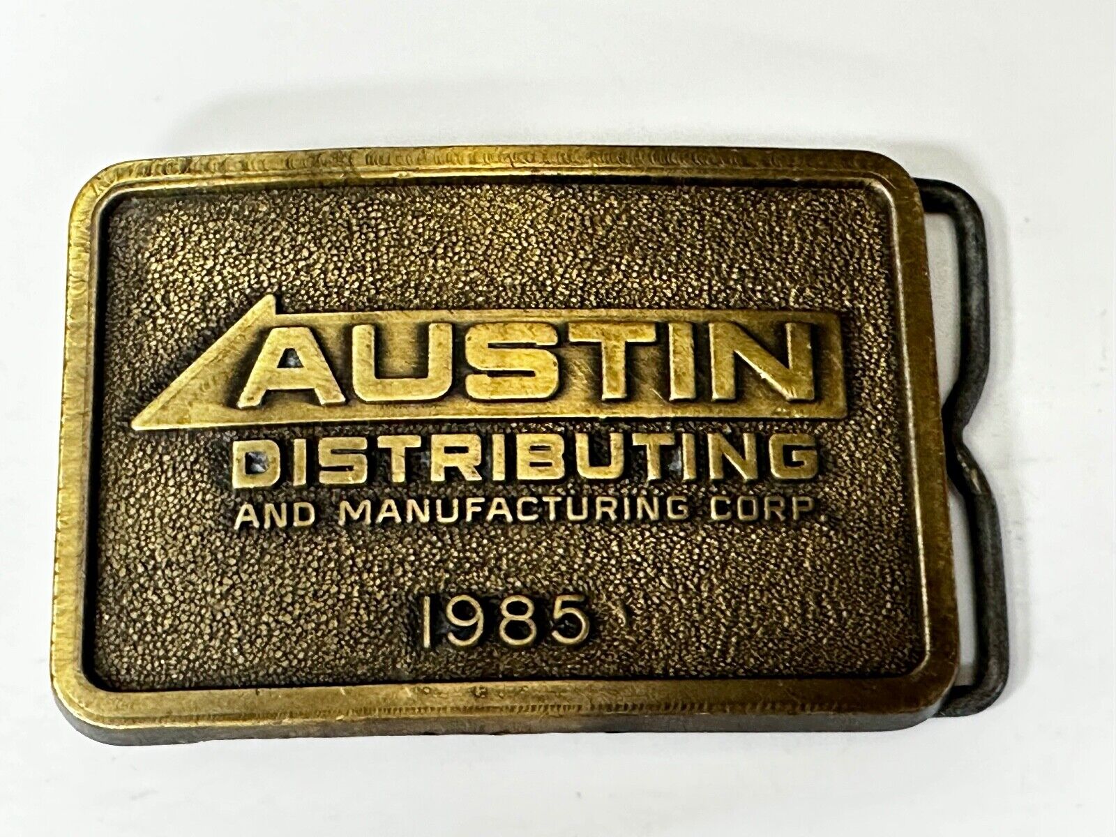 Austin Texas Distributing and Manufacturing 1985 Advertisement Promo Belt Buckle