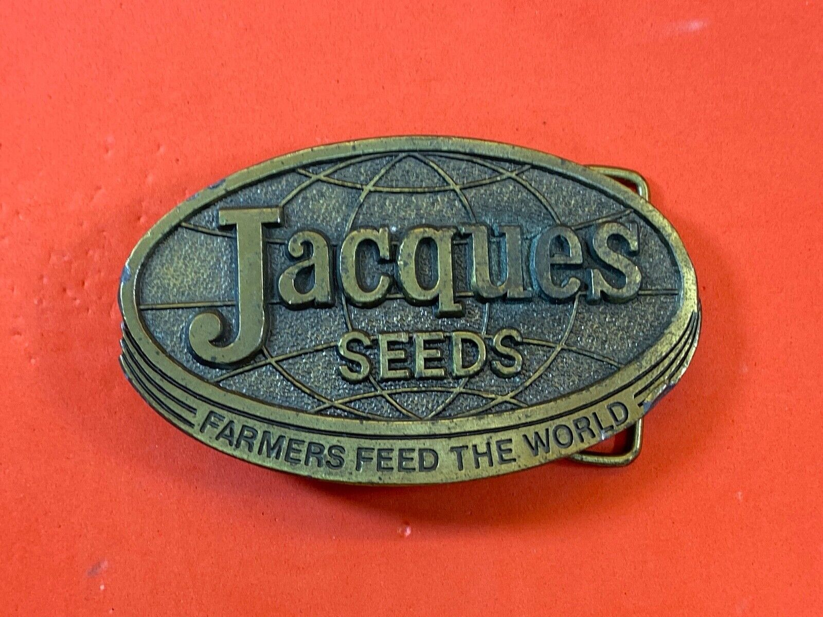 Vintage 1977 Jacques Seeds belt buckle  -  Farmers feed the world by lewis 