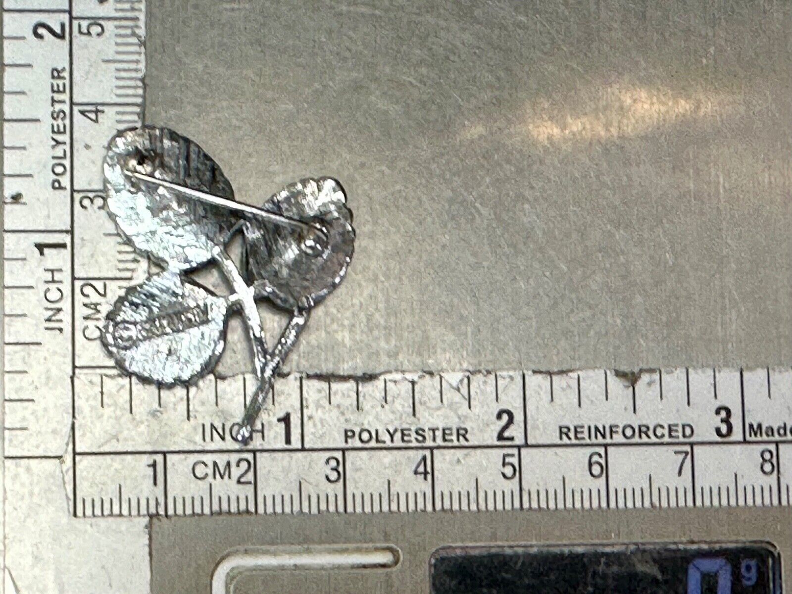 Three Leaf cutout Sarah Coventry signed silver tone brooch pin