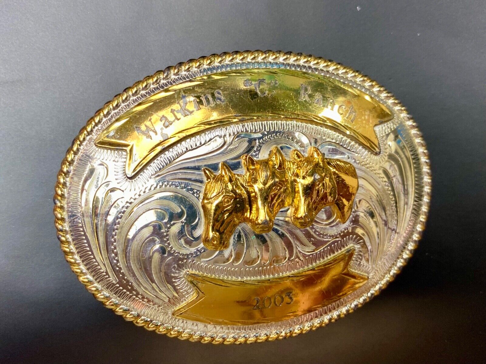 Three Horse heads silver tone? western belt buckle from Mexico- engraved ribbon