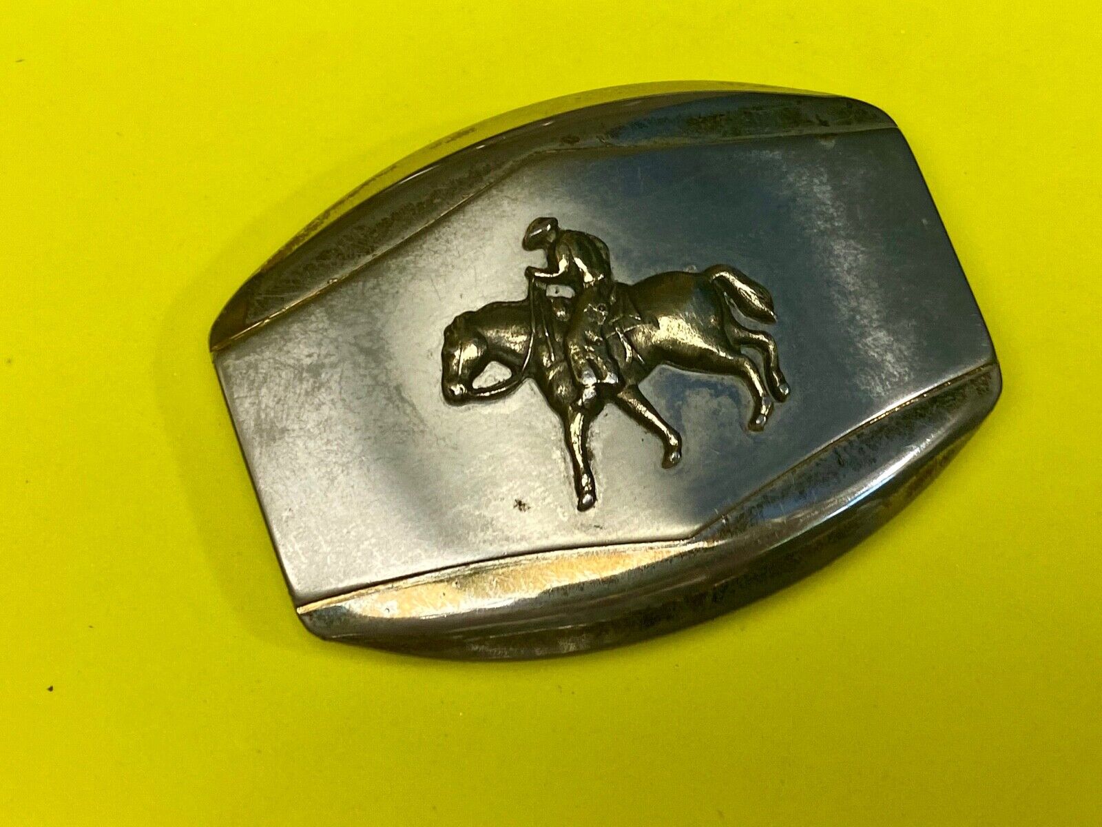 Vintage belt buckle Horseback old west cowboy riding the trail 