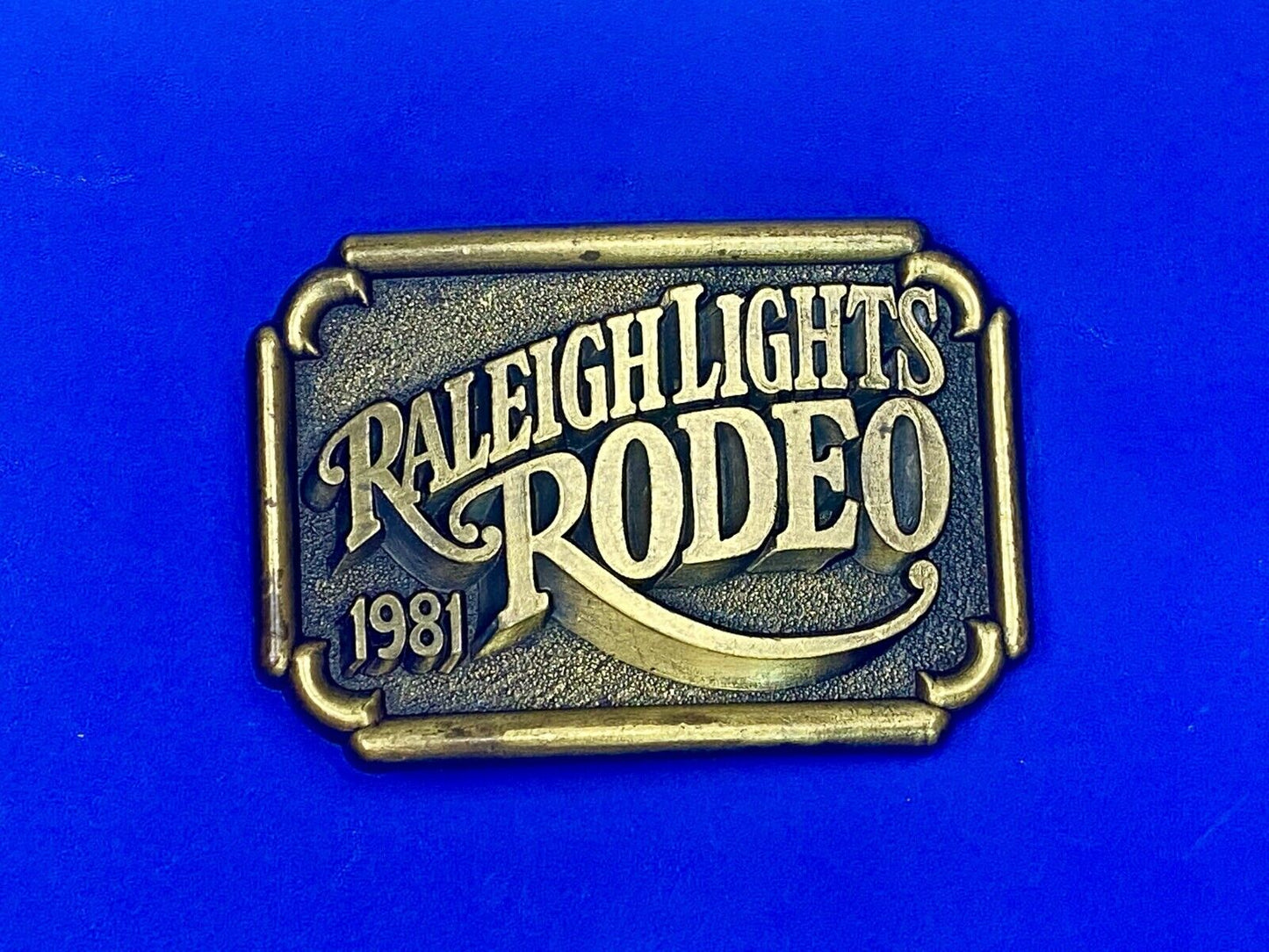 Vintage 1981 Raleigh Lights Rodeo Tobacco Company Advertising Belt Buckle