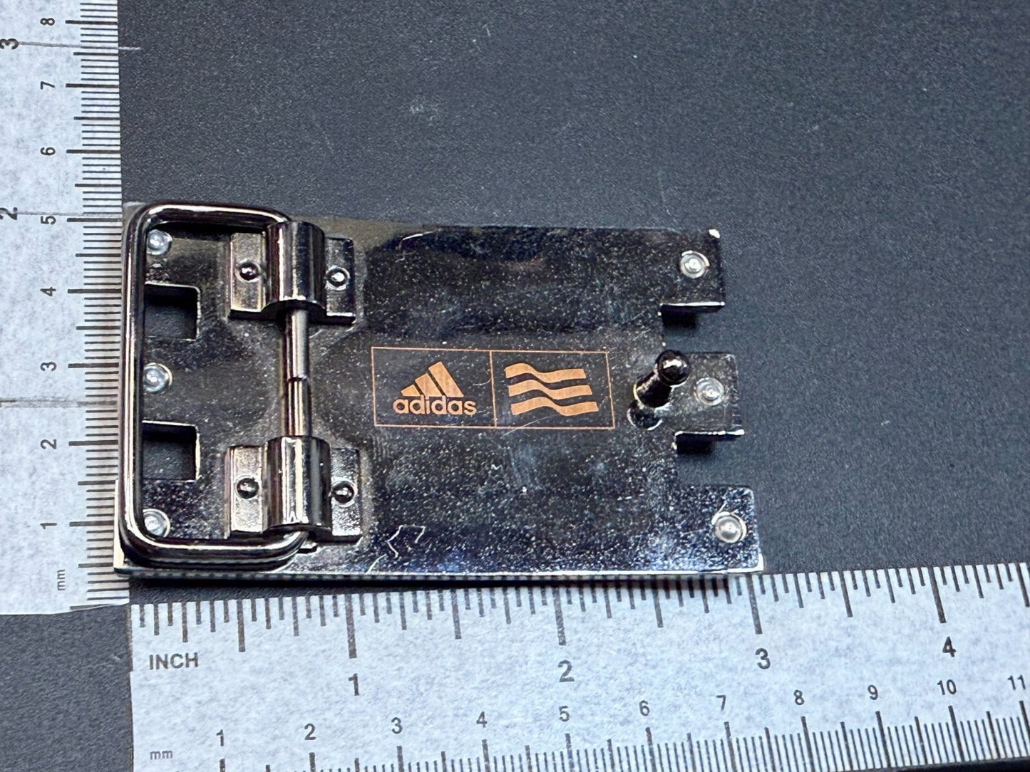 Adidas Golf Trophy Used Belt buckle - Orange on black stripes